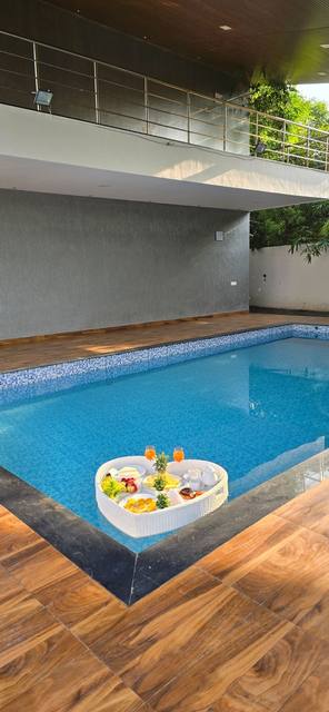 Private pool with a floating breakfast tray